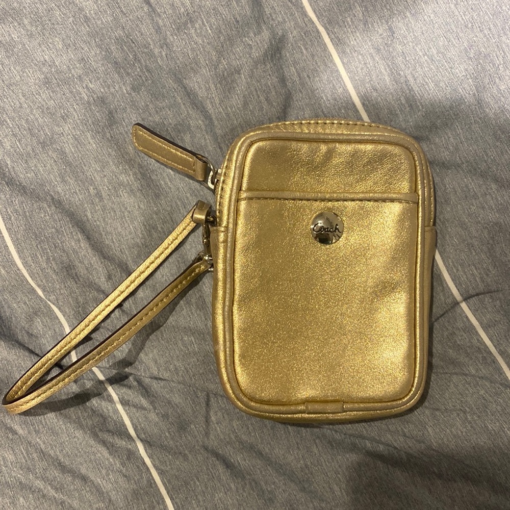 Small gold coach wristlet